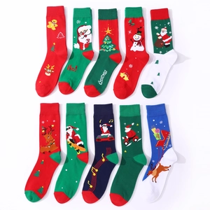 Festive Christmas crew socks set with Santa and reindeer patterns in multiple colors