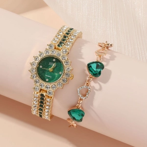 Luxury gold women's quartz watch and bracelet set with green gemstones and rhinestones