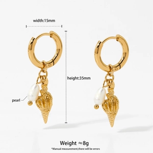 Detailed view of gold starfish and shell earrings with product dimensions and pearl material