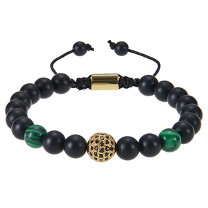 Detail of adjustable tiger eye bead bracelet with micro-pave zircon gold hollow ball