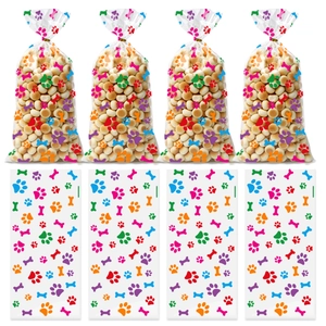 Detailed view of clear gift bags with colorful pet paw prints and bone patterns