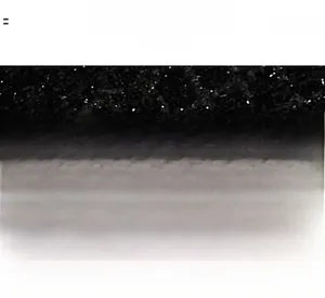 Close-up of premium black tweed fabric with soft breathable and eco-friendly texture