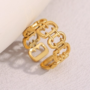 Macro shot of 18K gold plated hollow chain pattern open ring with fine metal texture
