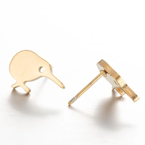 Macro shot of gold kiwi bird stud earrings showing fine metal details and backs