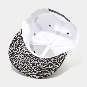 Vintage hip hop snapback hat with star embroidery and black and white patterned brim