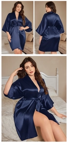 Detail of dark blue satin bathrobe showing silk finish and adjustable waist drawstring