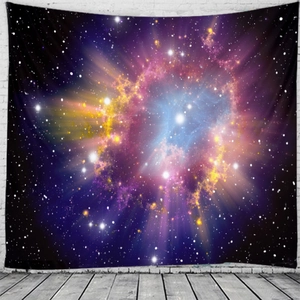 Nebula universe tapestry with purple and gold galaxy print on a clean white brick wall