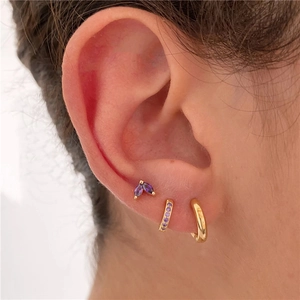 Three-piece gold ear set with purple marquise zircon studs and stacking hoops
