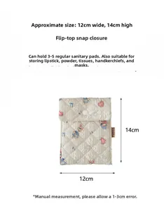 Quilted pouch with cartoon rabbit and heart pattern showing snap closure and 14cm size