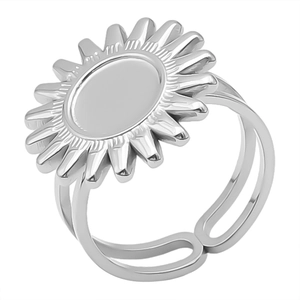 Macro detail of silver adjustable ring featuring a sunflower motif and hollow band design