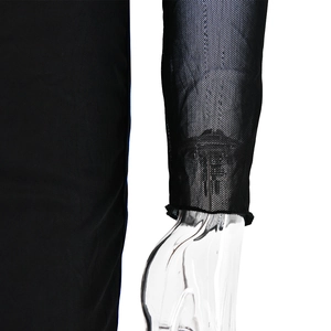 Detail of sheer black mesh long sleeve with seamless cuffs on a stylish evening dress