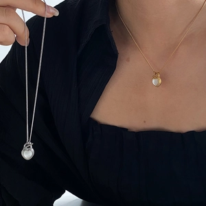 Elegant gold and silver heart-shaped opal necklaces for women with minimalist steel chains