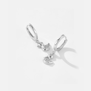 S925 sterling silver duck earrings with shimmering zircon stones on a white background