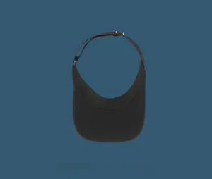 Detail of adjustable metal buckle and strap on a minimalist black sun visor hat
