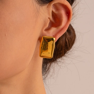 Minimalist 18K gold irregular rectangular earrings with textured metal finish on model