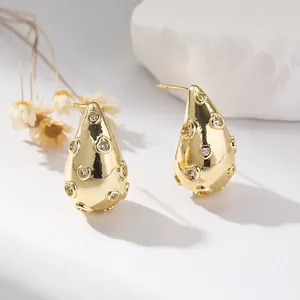 Elegant gold-tone teardrop earrings featuring heart-shaped zircon inlays for women