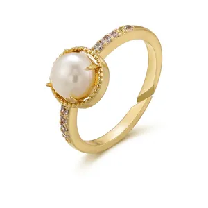 Elegant gold-plated brass open ring with large round pearl and sparkling zircon accents