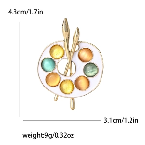 Vintage alloy enamel artist palette brooch with colorful gems and two small paintbrushes