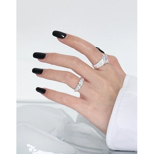 S925 sterling silver ring set with large square zircon and textured bands on ice background