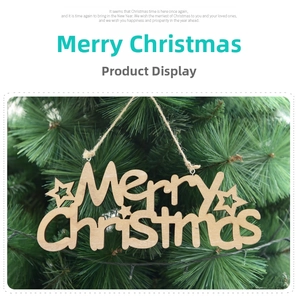 Detail of wooden Merry Christmas hanging ornament with star accents on pine needles