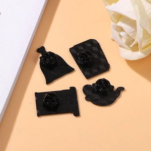 Starry universe metal pins showing honeycomb texture back and secure black rubber clutches