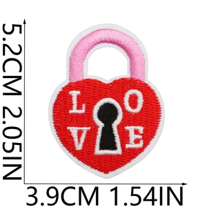 Detail view of heart lock embroidery patch with LOVE lettering and size measurements