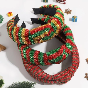Three Christmas knot headbands with festive red green and gold glitter stripes