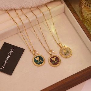 Vintage rose pendant necklaces in red, green, and white enamel with pearl accents