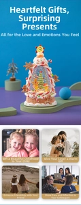 Close-up of a gingerbread tree water globe with festive LED light and interior snow