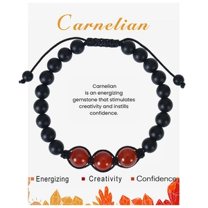 Adjustable carnelian and black matte bead woven bracelet with symbolic meaning card