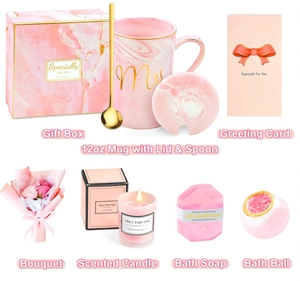 Detailed gift set including 12oz tulip ceramic mug, scented candle, and soap in a pink box