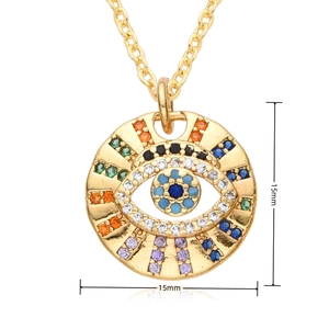 Macro shot of 15mm evil eye pendant with colorful zircons in gold plated finish