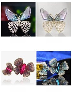 Detail view of butterfly brooches Style 17-20 with colorful crystals and rhinestones