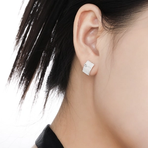 Minimalist S925 sterling silver rectangular stud earrings with brushed texture and tiny diamond