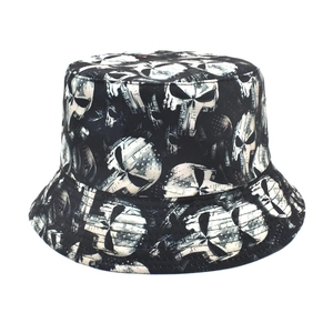 Black and white bucket hat with skull and flag print for outdoor sun protection