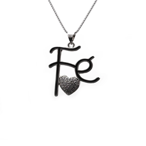Detailed shot of silver chain necklace featuring Fe letter pendant with a heart-shaped zircon
