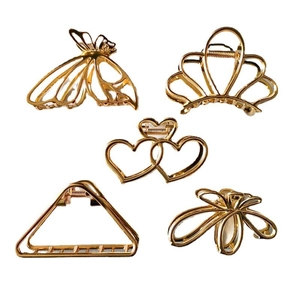 Set of five gold hollow metal butterfly and geometric hair claws for elegant women styles