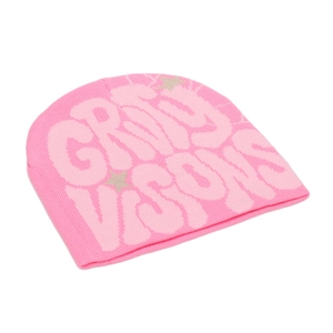 Detail view of pink ribbed beanie featuring large jacquard griviy visions text patterns
