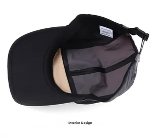 Detail view of the 5-panel hat interior showing polyester lining and adjustable strap