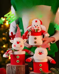 Three-piece Christmas knit gift jars featuring reindeer, snowman and Santa Claus designs