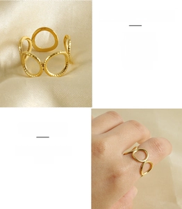Close-up of overlapping gold stainless steel rings with brushed texture on model's hand