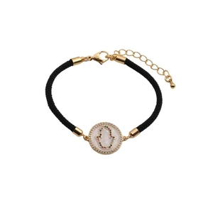 Detail of Hamsa Hand charm on black braided bracelet with colorful zircon accents