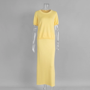 Detail of light yellow knit set featuring fine texture and high elastic fabric drape