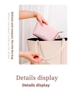 Pink PU leather pouch being placed inside a large tote bag for organized storage