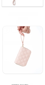 Detail of light pink quilted card holder with zipper closure and leather wrist strap