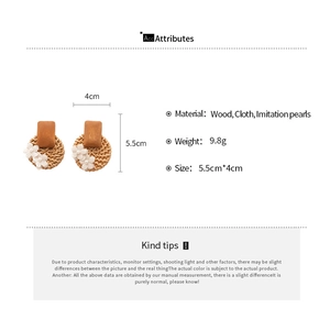 Detailed size and material specifications for handmade bohemian wooden flower earrings