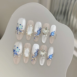 Faux ongles à motif floral bleu, effet œil de chat et détails dorés, lot de 10