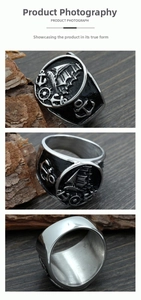 Macro detail of nautical vintage stainless steel ring with sailboat and anchor carvings