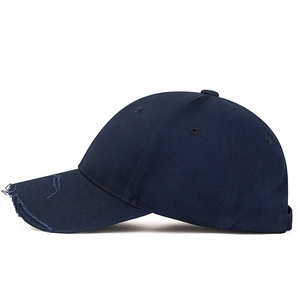 Distressed dark blue baseball cap with frayed brim and classic six-panel design