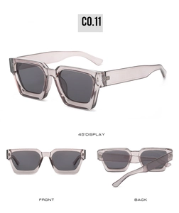 Three-angle view of oversized square sunglasses in transparent gray with dark lenses
